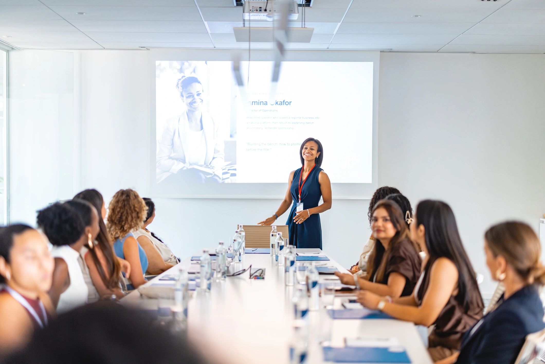 Presenter leading a professional development session for an audience of educators