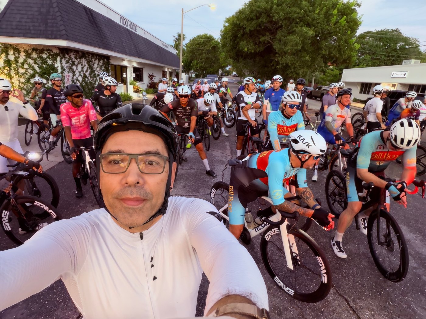 Ricardo taking a selfie with a large group of cyclists at the start of the Bill Bone Giro